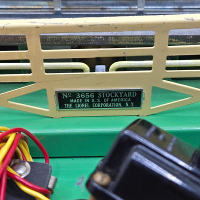 LOT 105X: Lionel Train Cars, Stockyard, and More