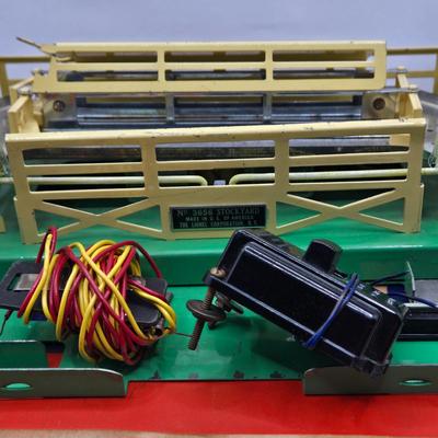 LOT 105X: Lionel Train Cars, Stockyard, and More