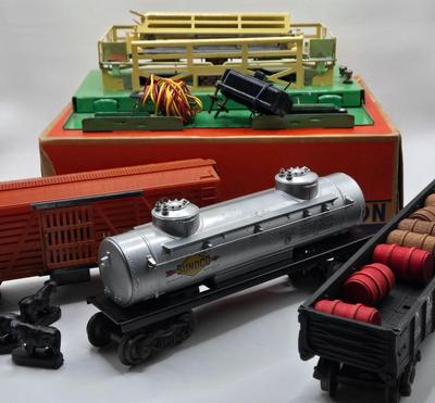 LOT 105X: Lionel Train Cars, Stockyard, and More
