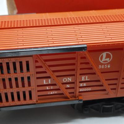 LOT 105X: Lionel Train Cars, Stockyard, and More