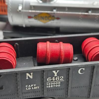 LOT 105X: Lionel Train Cars, Stockyard, and More