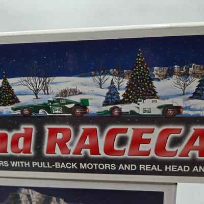 LOT 108X: First of Three Lots/ 6 NIB Hess Trucks