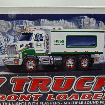 LOT 108X: First of Three Lots/ 6 NIB Hess Trucks
