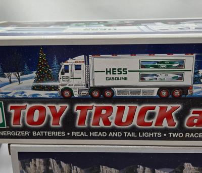 LOT 108X: First of Three Lots/ 6 NIB Hess Trucks