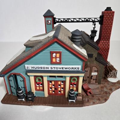 LOT 115X: Dept. 56 "J. Hudson Stoveworks" and " Bluebird Seed and Bulb" / with Original Boxes