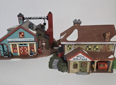 LOT 115X: Dept. 56 "J. Hudson Stoveworks" and " Bluebird Seed and Bulb" / with Original Boxes