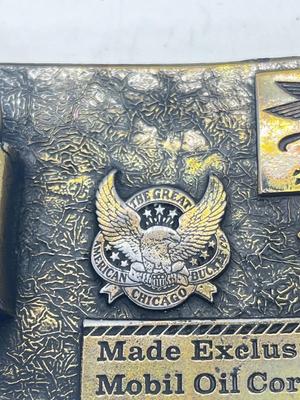 LOT 121J: Mobil Belt Buckle and Anson Tie Pin