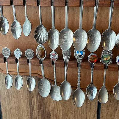 LOT 144D: Collection of Souvenir Spoons on Rack