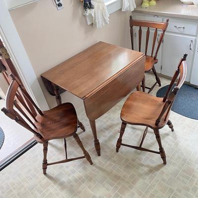 LOT 145K: Drop Leaf Kitchen / Dining Table w/ Four Chairs