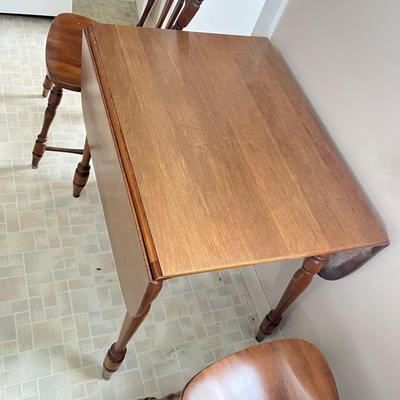 LOT 145K: Drop Leaf Kitchen / Dining Table w/ Four Chairs