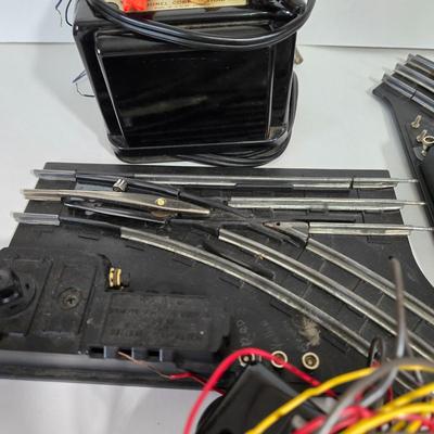 LOT 162X: Lionel Train Tracks, American Flyer Transformer, and More