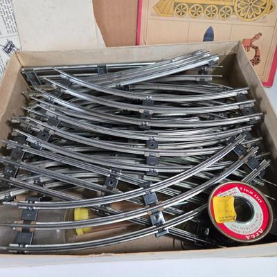 LOT 162X: Lionel Train Tracks, American Flyer Transformer, and More