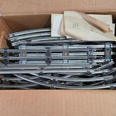 LOT 162X: Lionel Train Tracks, American Flyer Transformer, and More
