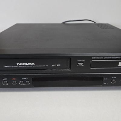 LOT 166X: Daewoo VCR/DVD Player - Model 6T811N