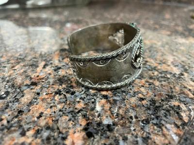 Two Metal Cuff Bracelets with Artisan Designs