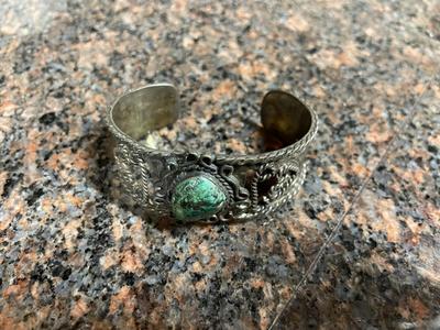 Two Metal Cuff Bracelets with Artisan Designs
