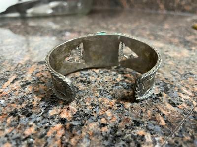 Two Metal Cuff Bracelets with Artisan Designs