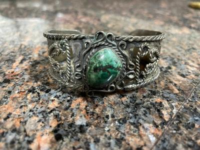 Two Metal Cuff Bracelets with Artisan Designs