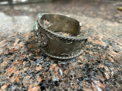 Two Metal Cuff Bracelets with Artisan Designs