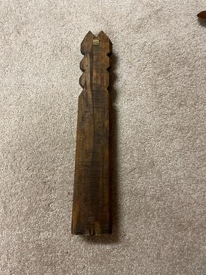 Hand-Carved Wooden Sculpture of a Person in Headdress