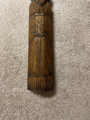 Hand-Carved Wooden Sculpture of a Person in Headdress
