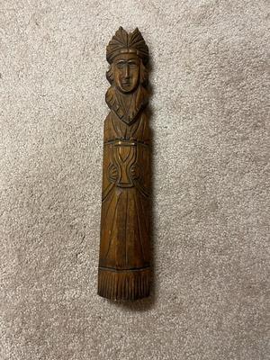 Hand-Carved Wooden Sculpture of a Person in Headdress