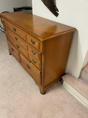Wooden Dresser with Brass Hardware and Multiple Drawers