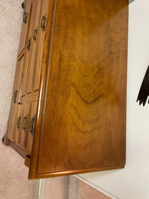 Wooden Dresser with Brass Hardware and Multiple Drawers
