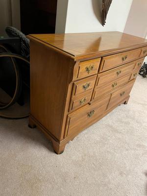 Wooden Dresser with Brass Hardware and Multiple Drawers