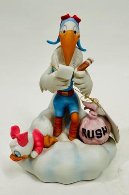 RUSH DELIVERY Disney New Arrivals Musical Stork Figurine w/ Baby Daisy 1984 Vintage music box