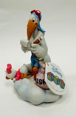 RUSH DELIVERY Disney New Arrivals Musical Stork Figurine w/ Baby Daisy 1984 Vintage music box