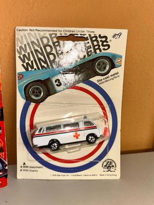 1971 TOOTSIE TOYS IN ORIGINAL PACKAGE, ALONG WITH 1976 MINI MACK AND WINDRACER & TOOTSIE TOY ARMY TANK