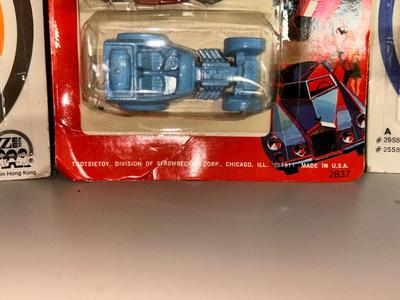 1971 TOOTSIE TOYS IN ORIGINAL PACKAGE, ALONG WITH 1976 MINI MACK AND WINDRACER & TOOTSIE TOY ARMY TANK