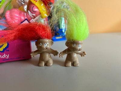 PEZ IN PACKAGES AND TROLL DOLLS