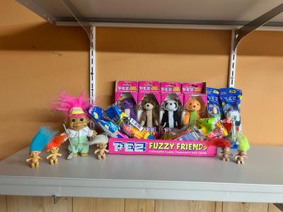 PEZ IN PACKAGES AND TROLL DOLLS