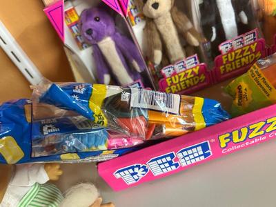 PEZ IN PACKAGES AND TROLL DOLLS