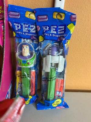 PEZ IN PACKAGES AND TROLL DOLLS