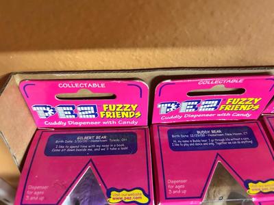 PEZ IN PACKAGES AND TROLL DOLLS