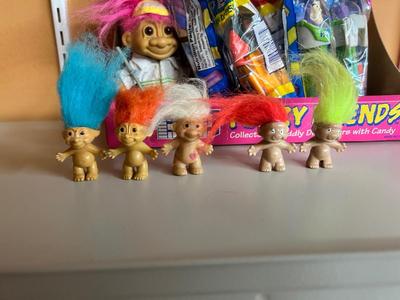 PEZ IN PACKAGES AND TROLL DOLLS