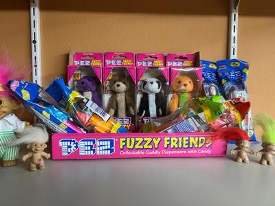PEZ IN PACKAGES AND TROLL DOLLS