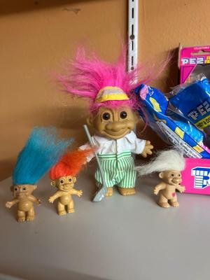 PEZ IN PACKAGES AND TROLL DOLLS