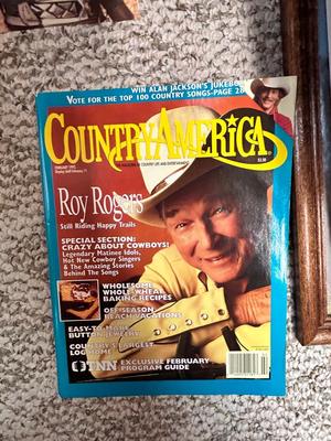 ROY ROGERS LITERATURE, WALL CLOCK AND COLLECTIBLE TIN