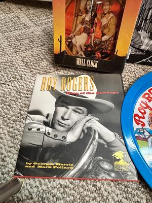 ROY ROGERS LITERATURE, WALL CLOCK AND COLLECTIBLE TIN