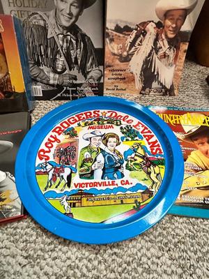 ROY ROGERS LITERATURE, WALL CLOCK AND COLLECTIBLE TIN
