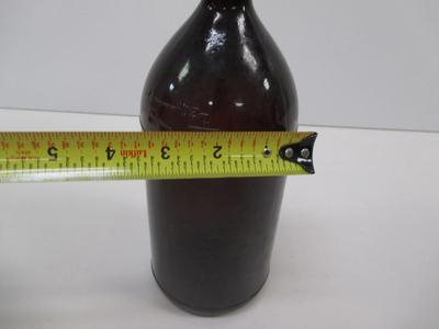 Vintage Brown Bottle With Cap Stamped On The Bottom