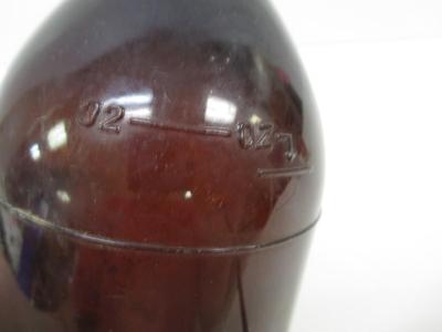 Vintage Brown Bottle With Cap Stamped On The Bottom