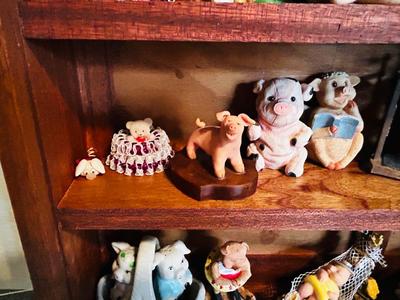 DISPLAY CASE PACKED FULL OF PIGS