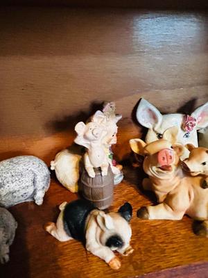 DISPLAY CASE PACKED FULL OF PIGS