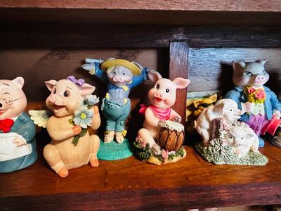 DISPLAY CASE PACKED FULL OF PIGS