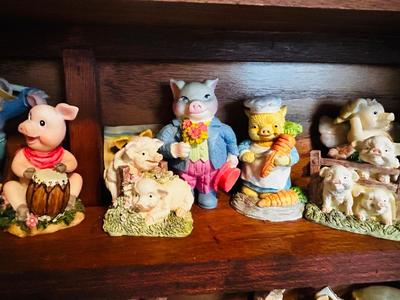 DISPLAY CASE PACKED FULL OF PIGS